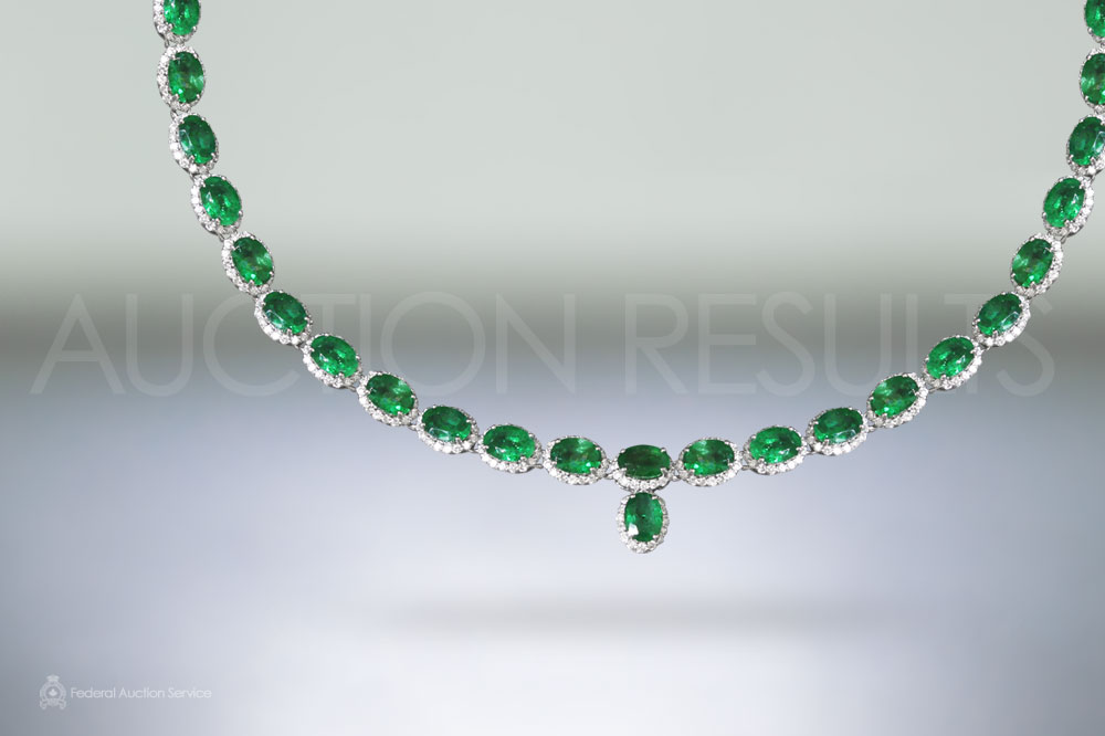 33.78ct (TW) Oval Cut Emeralds and Diamond Necklace sold for $15,000