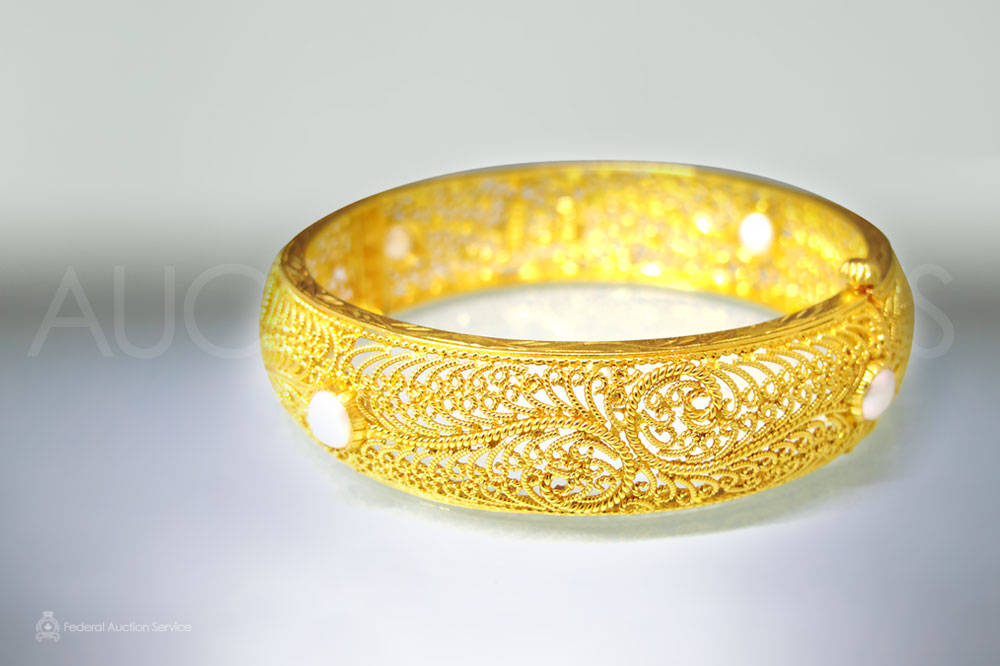 Fine Yellow Gold Hinged Bangle Stamped 22k sold for $2,300