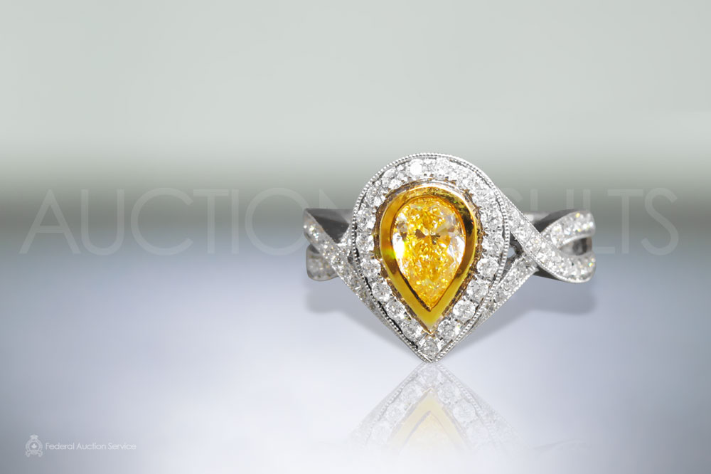 EGL Certified 1.02ct Pear Shape Fancy Yellow Diamond Ring sold for $7,200