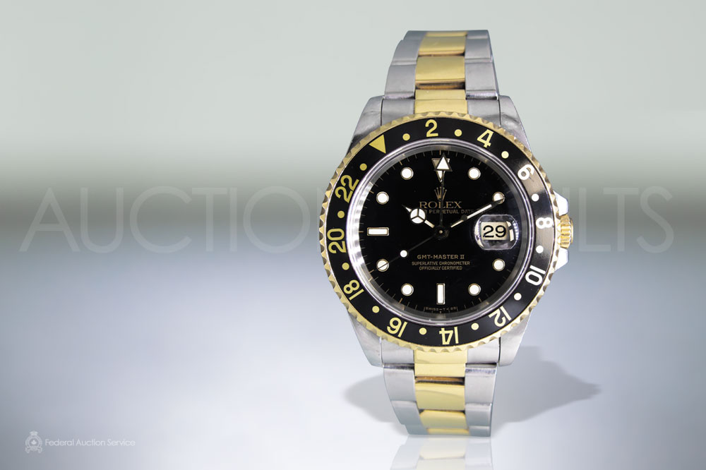 Men's 18k Yellow Gold/Stainless Steel Rolex 'GMT-Master II' Automatic Chronometer sold for $8,500