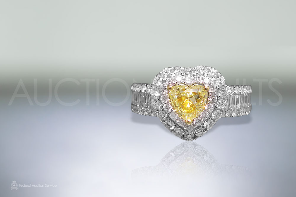 0.78ct Heart Brilliant Cut Fancy Yellow Diamond Ring sold for $7,000