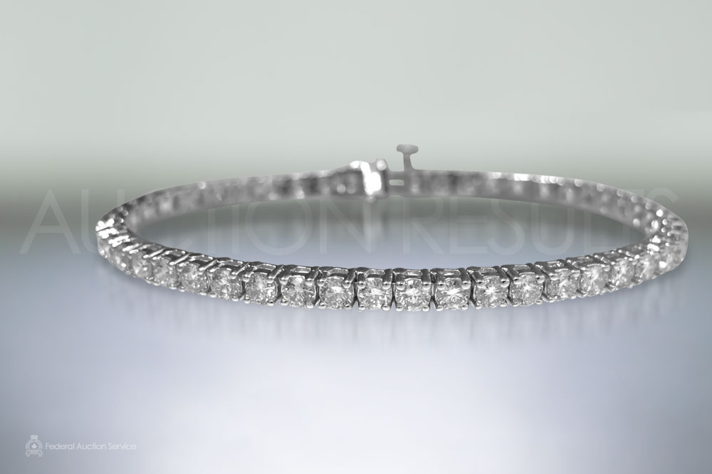Lady's 14k White Gold 7.16ct (TDW) Diamond Tennis Bracelet sold for $8,500