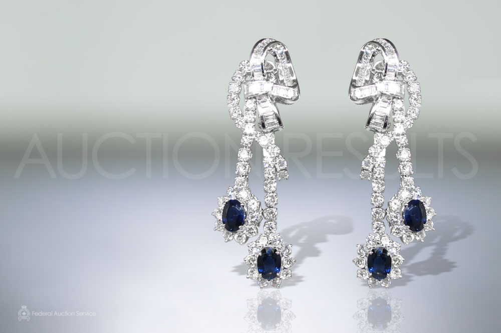 Lady's 18k White Gold Blue Sapphire and Diamond Dangling Earrings sold for $9,100