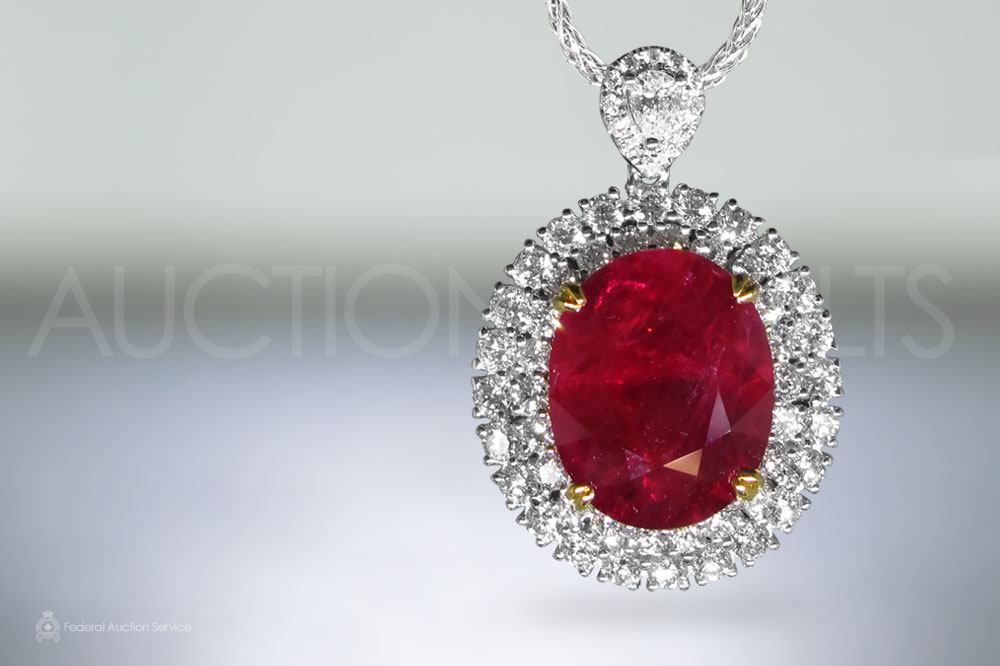 C. Dunaigre Switzerland Certified 11.58ct Oval Cut Ruby and Diamond Pendant Necklace sold for $36,000