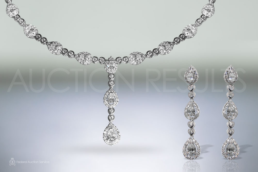 Elegant 18k White Gold 10.36ct (TDW) Diamond Necklace and Matching Earrings Set sold for $17,500