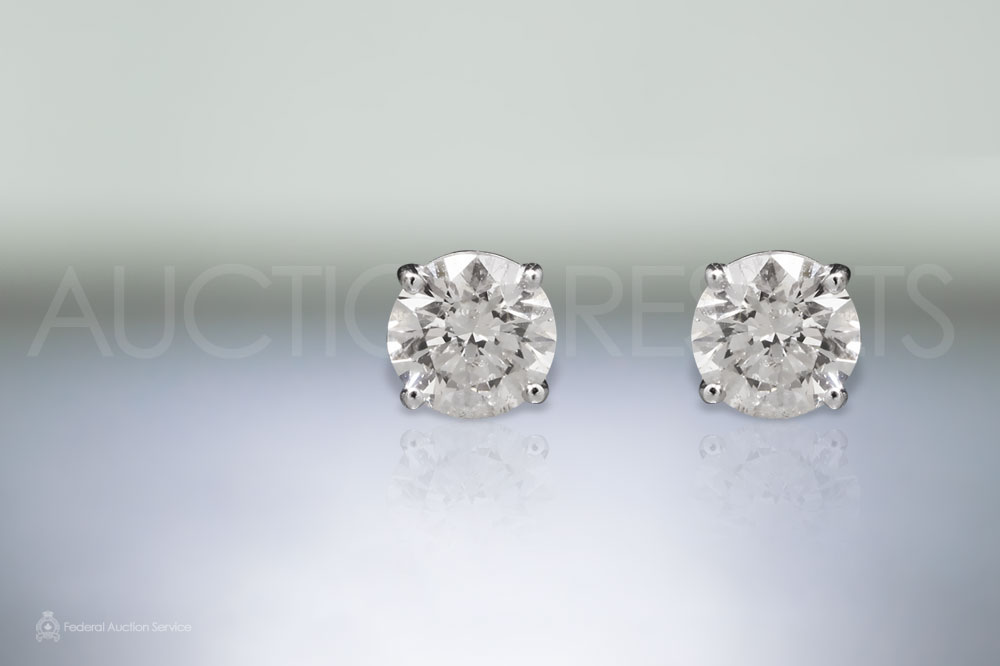 Lady's 14k White Gold 2.73ct (TDW) Canadian Diamond Stud Earrings sold for $14,000