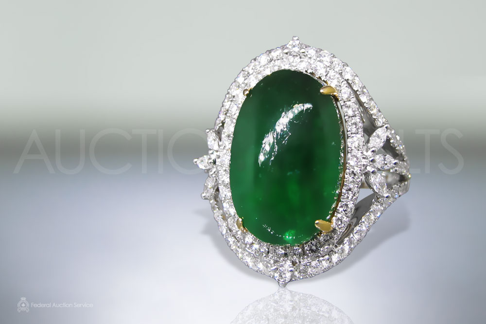 12.55ct Oval Cabochon Colombian Emerald and Diamond Ring sold for $8,000