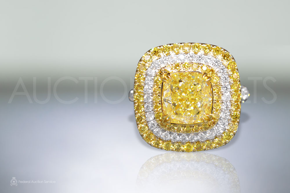 EGL Certified 3.17ct Cushion Cut Fancy Yellow Diamond Ring sold for $30,000