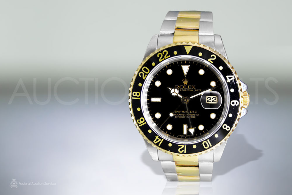 Men's 18k Yellow Gold/Stainless Steel Rolex 'GMT-Master II' Automatic Chronometer sold for $10,000